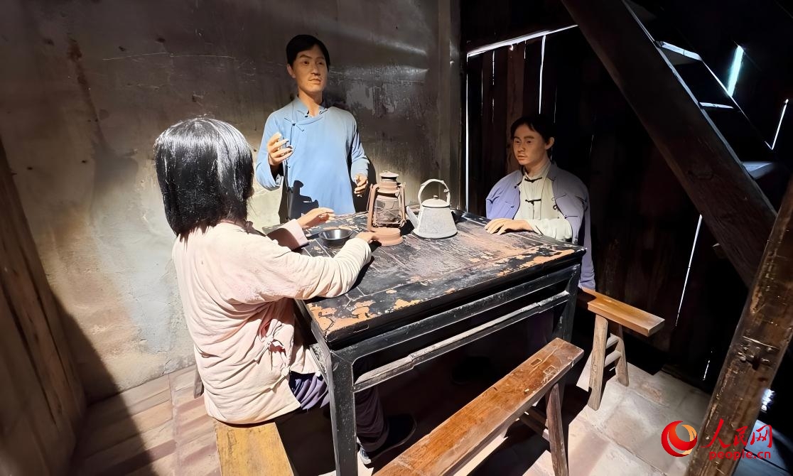 “红军街”胜一理发店，是中共城口特别支部秘密交通联络站旧址。人民网记者 李昊洋摄